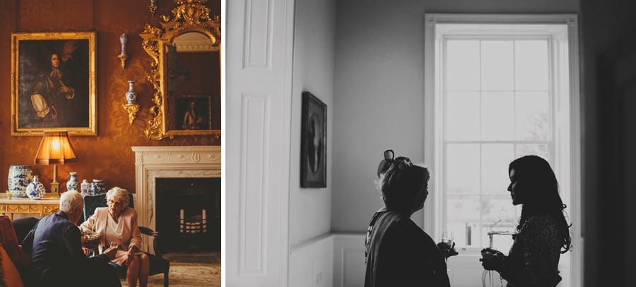 Wedding guests talk to each other at Stubton Hall