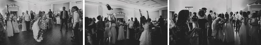 The bride throws her bouquet to the female wedding guests on the dancefloor at Stubton Hall
