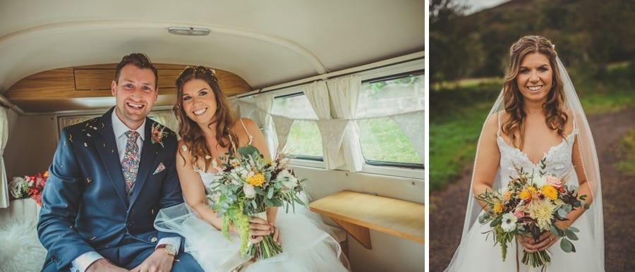 The bride and groom pose for a photograph in the wedding car