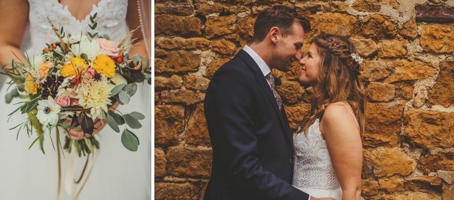 The bride and groom outside the Tithe Barn in Symondsbury, Dorset