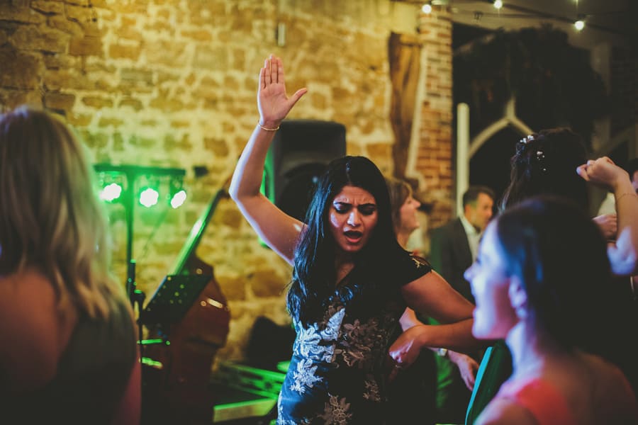 A wedding guest dancing