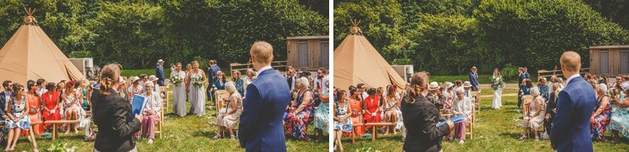 The bridesmaids walk up the aisle of the outdoor ceremony