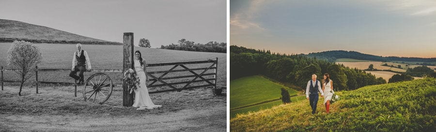 The bride and groom pose for a photograph before they walk up the hill at yurt retreat