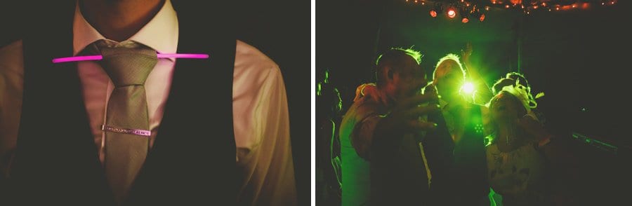 A flourescent tube hangs through the grooms tie