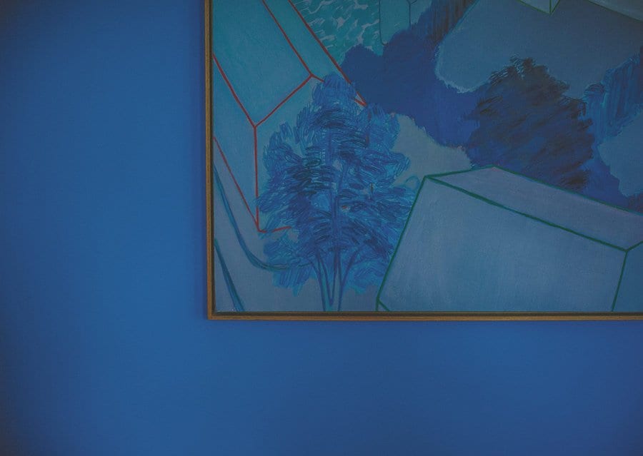 A painting hangs on the wall at Cowley Manor in Cheltenham