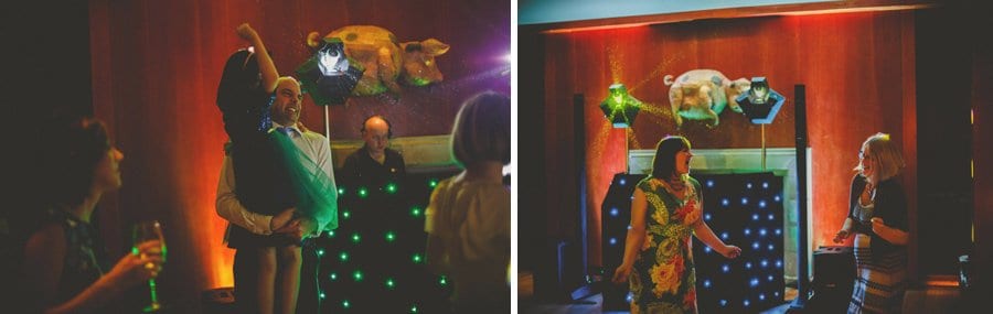 Wedding guests dancing on the dancefloor at Cowley Manor Hotel in Cheltenham