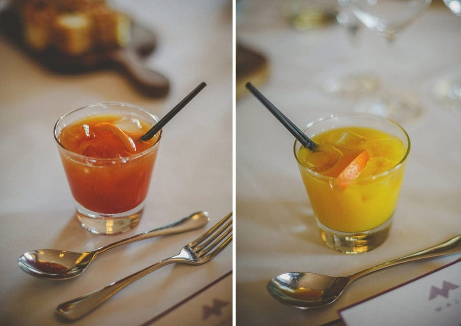 Cocktail drinks with black straws inside them