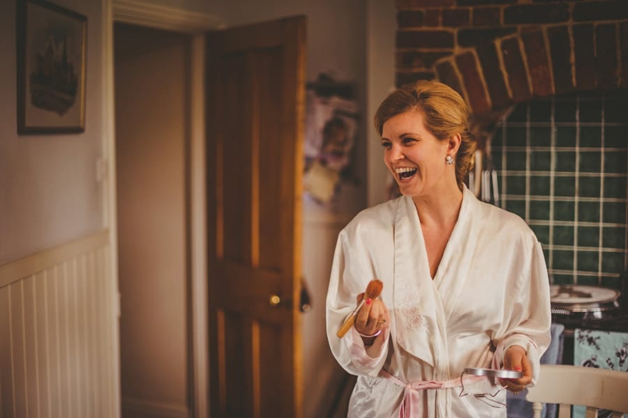 The brides sister laughs