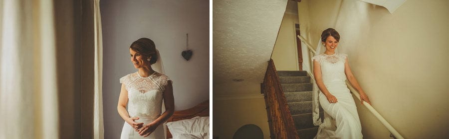 The bride walks down the stairs of her parents house