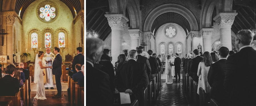 The bride and groom stand and face each other in the Church during the wedding ceremony