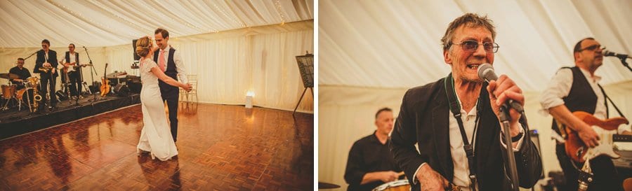 The bride and groom dance together on the dancefloor in the marquee