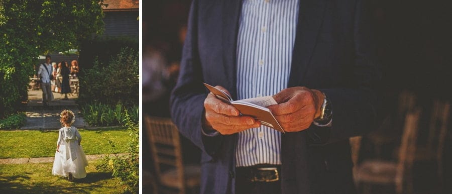 A flower girl walks across the garden at Micklefield Hall
