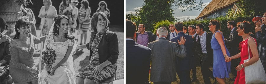 Wedding guests start to make their way to the outdoor ceremony at Micklefield Hall