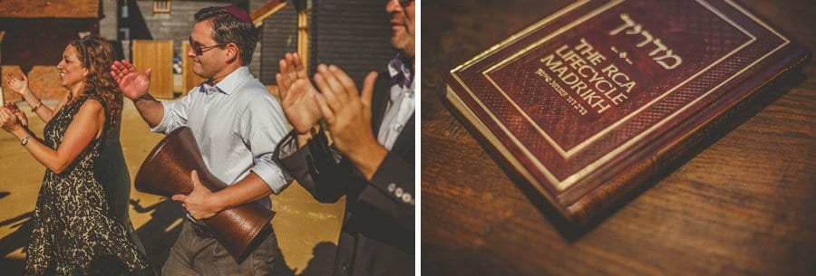 Wedding guests walk across the courtyard and bang drums at the end of the outdoor wedding ceremony at Micklefield Hall
