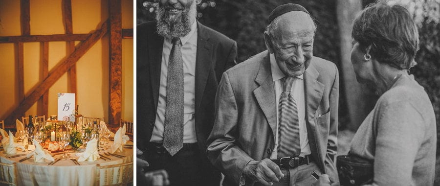Wedding guests chat amongst each other in the courtyard at Micklefield Hall wedding venue