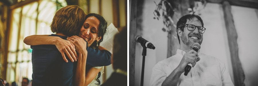 The bride embraces her mother in the barn at Micklefield Hall