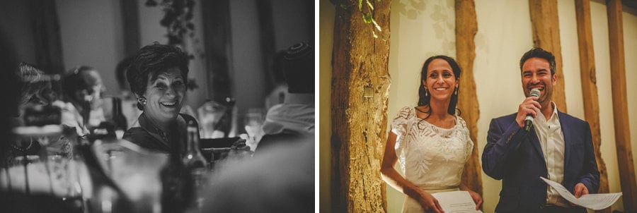 The bride and groom stand up and deliver their speech to the wedding guests in the barn at Micklefield Hall