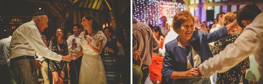 The bride dances with her family on the dancefloor