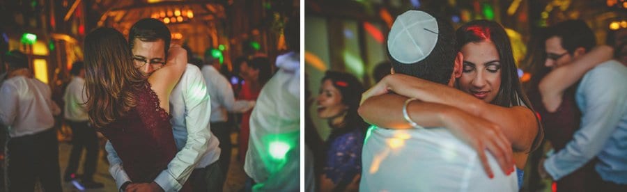 Wedding guests dancing with their partners on the dancefloor