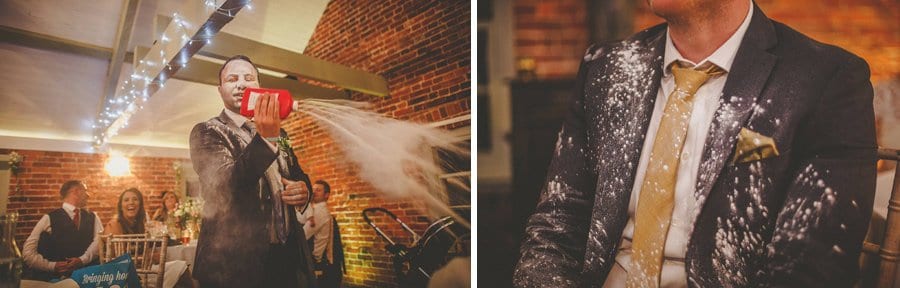 The best man pours talcum powder over a wedding guest during his speech