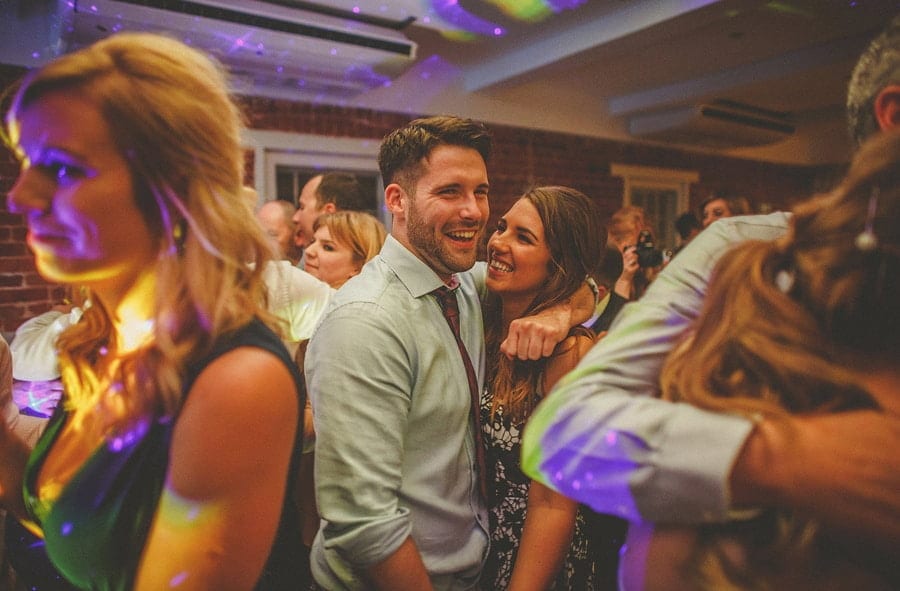 A man holds his wife in his arms on the dancefloor