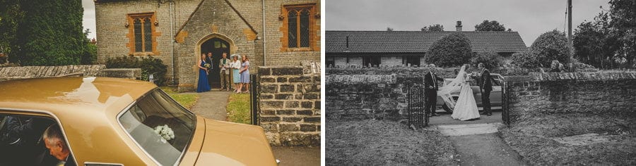 The bridesmaids watch at the door of the church while the bride and her father exit the car