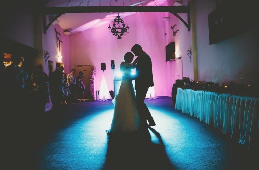 The bride and groom dance together on the dance floor at Yarlington barn in Somerset