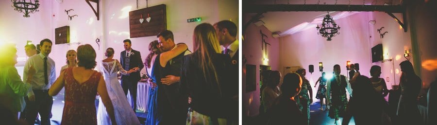 Wedding guests dancing together at Yarlington barn