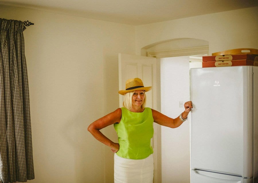 A lady looks on as ushers get ready