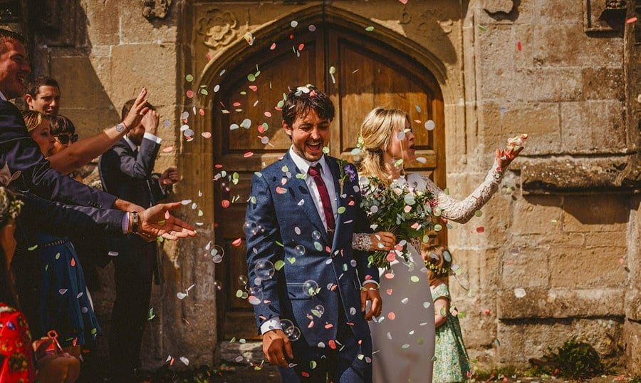 Wedding petals fall to the ground