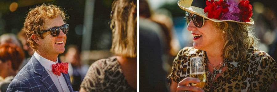 Wedding guests chatting and drinking champagne