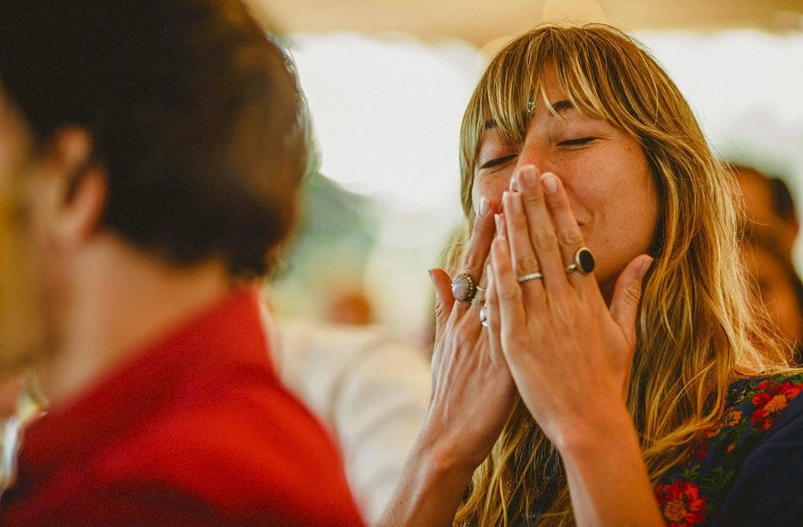 Friends and family laugh and applaud