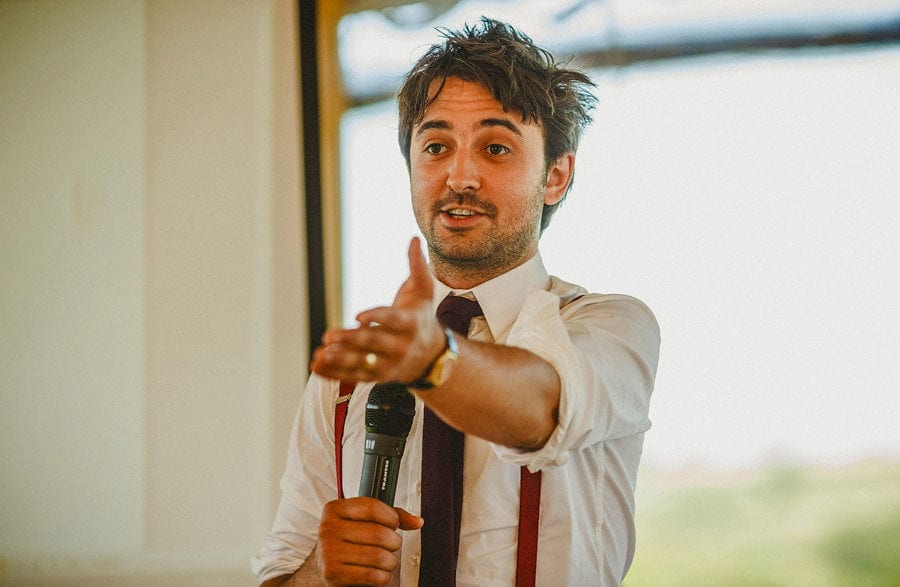 The groom mentions his mother on his wedding speech in the marquee
