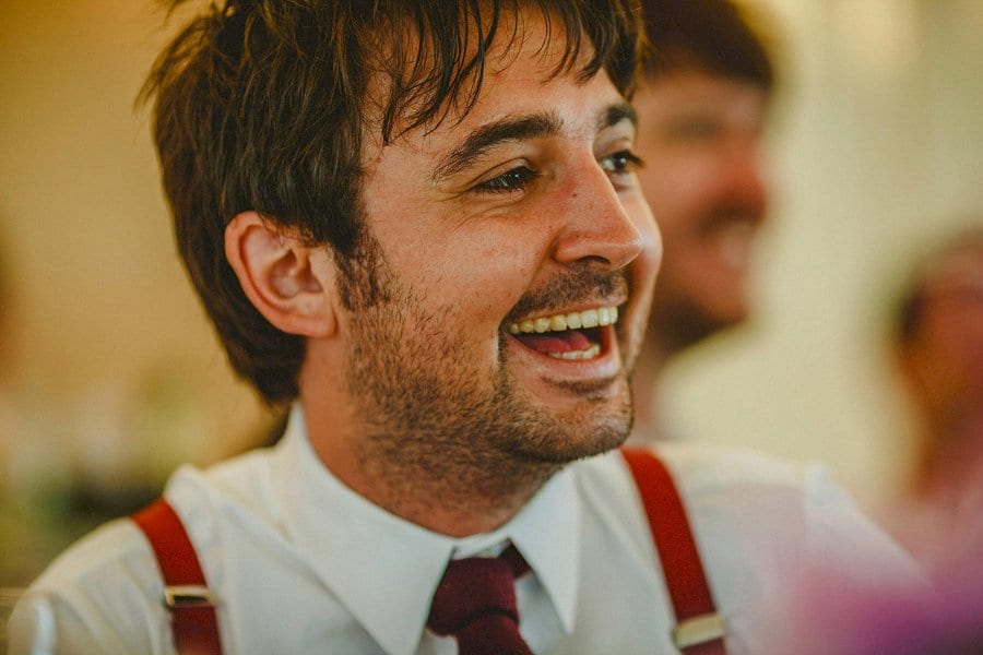 The groom laughs