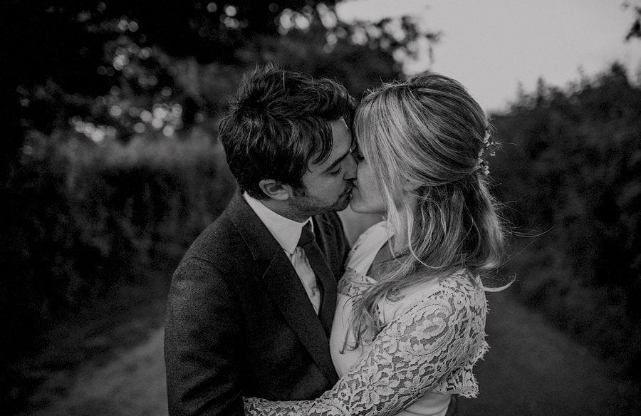The bride and groom pose for photographs