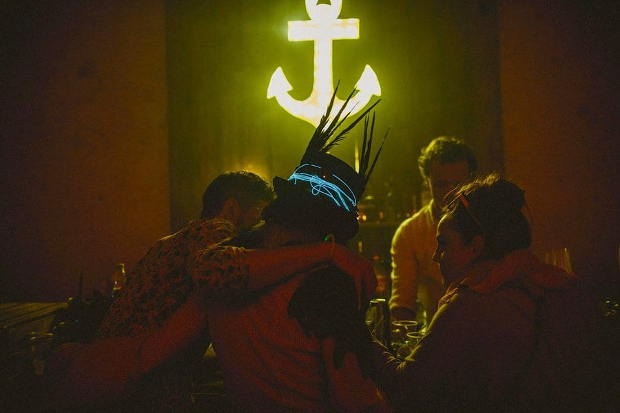 A couple embrace each other at the end of the night