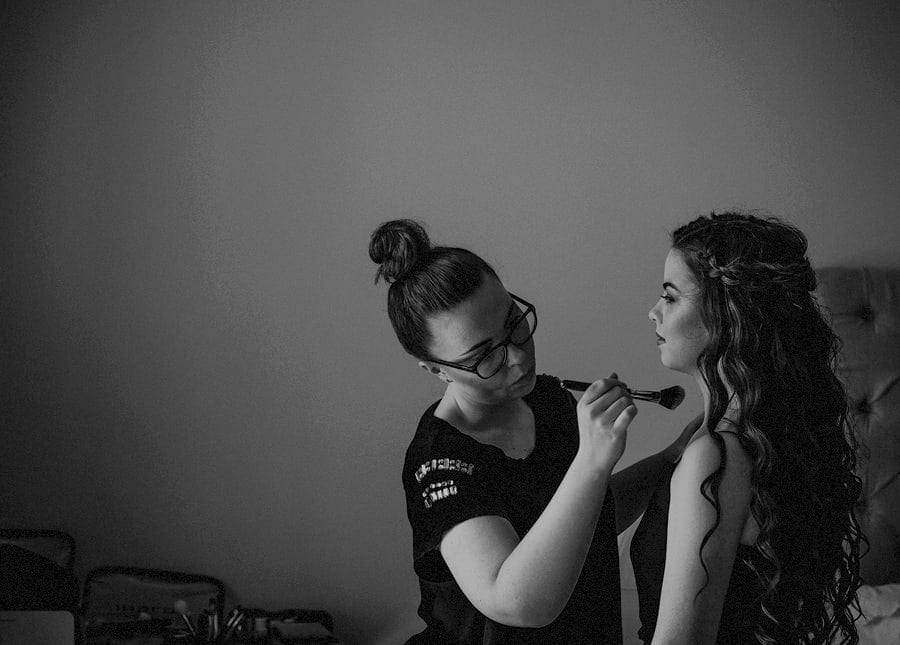 A bridesmaid gets ready