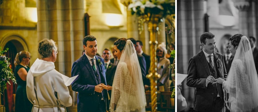 The bride and groom exchange rings during the wedding ceremony