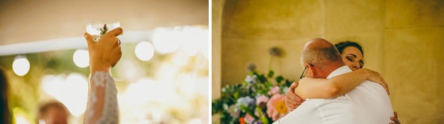 The bride hugs her father and cries after his wedding speech