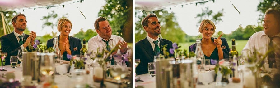 One of the bridesmaids points her finger at the groom