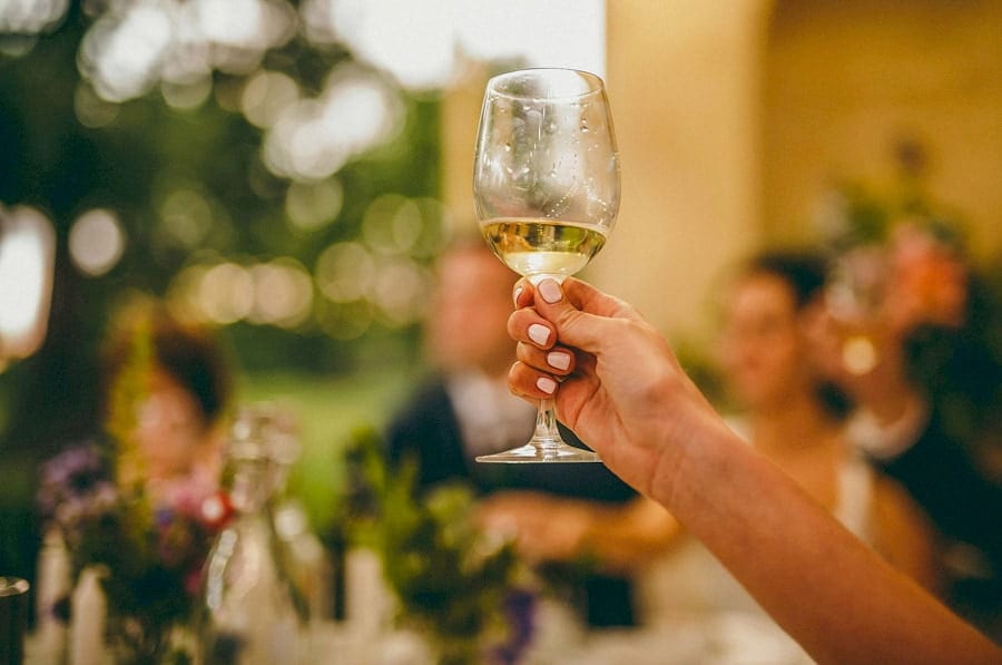The bride raises her glass to the best mans speech