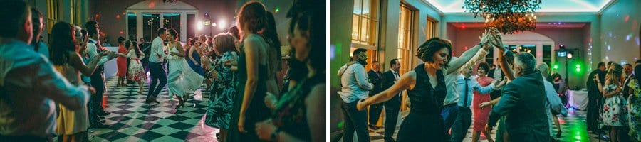 The bride and groom dancing with friends and family on the dancefloor