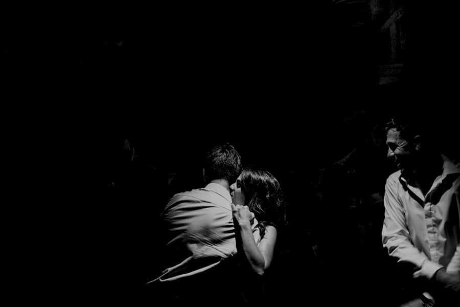 Wedding guests dancing on the dancefloor in the barn