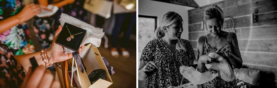 A bridesmaid opens a box with a bracelet inside it