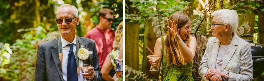 Wedding guests chat to each other in the woods at the Yurt Retreat, Crewkerne