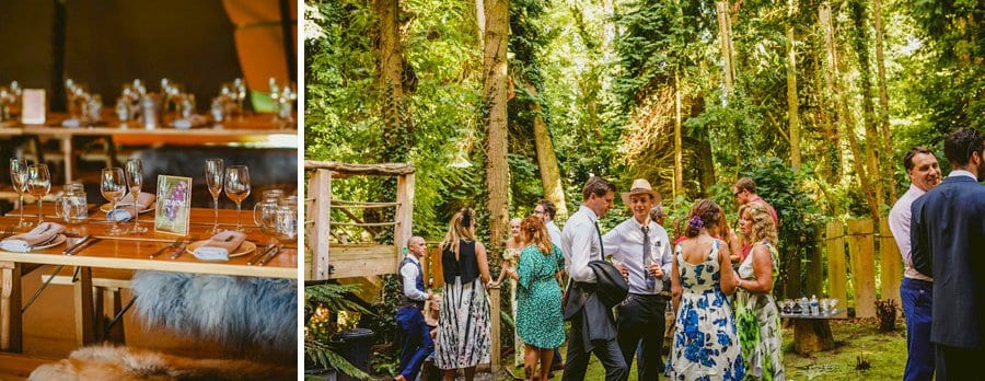 Wedding guests chat amongst themselves in the woods at yurt retreat