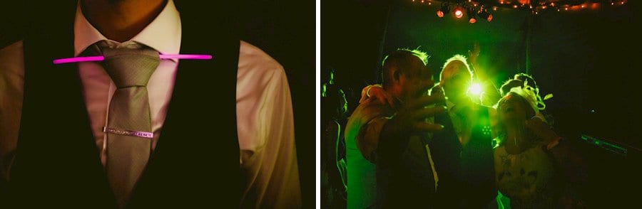 A florescent tube hangs through the grooms tie