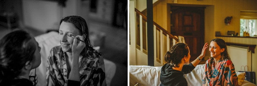 The make up artist applies makeup to the brides face