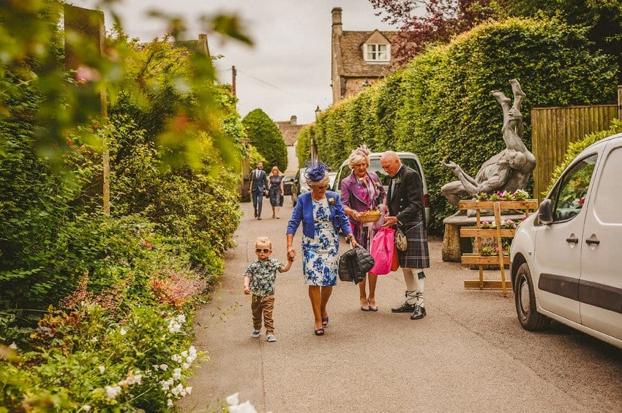 The groom's family arrive at Abbey House gardens