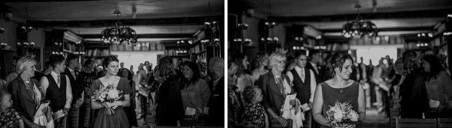 The bridesmaids walk down the aisle